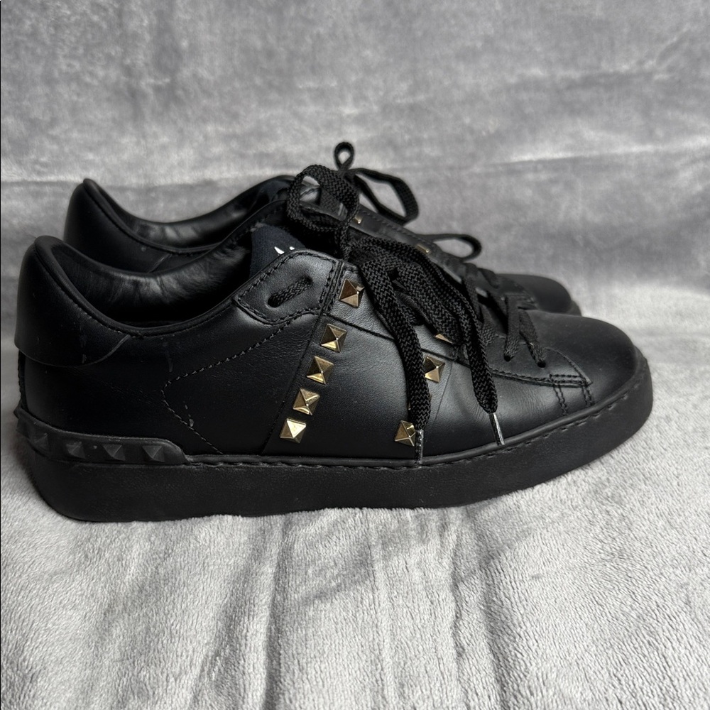 Valentino Garavani Black Sneakers with Gold Studs
